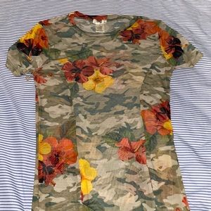 Hello I am selling a mesh dress size small.